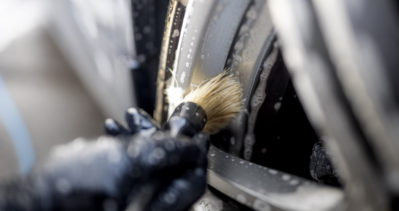 Exquisite Mobile Detailing Using A Fine Brush On A Wheel